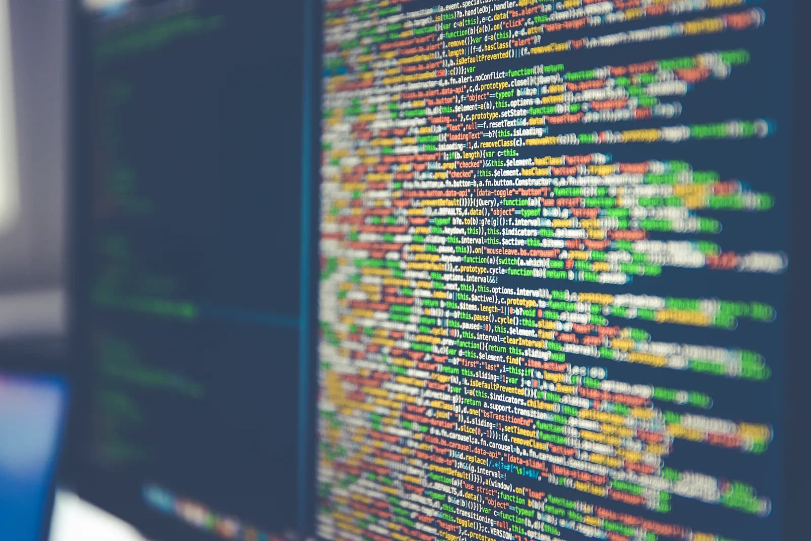 Website source code displayed on a computer monitor